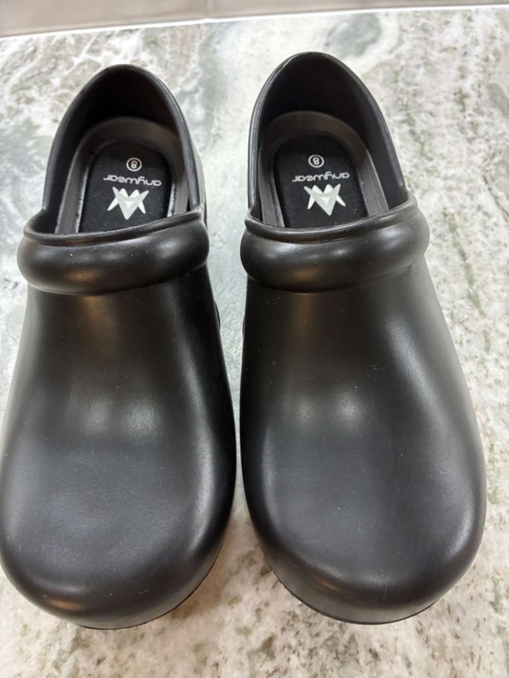 Anywear Black Slip-On Clogs. These are work shoes.